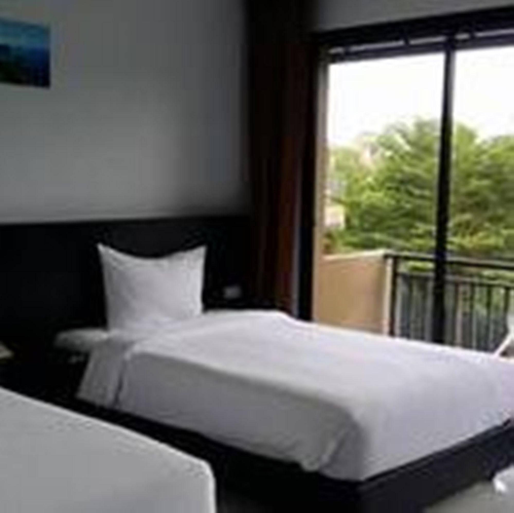 Naiyang Beach Hotel Sha Plus Phuket Exterior photo